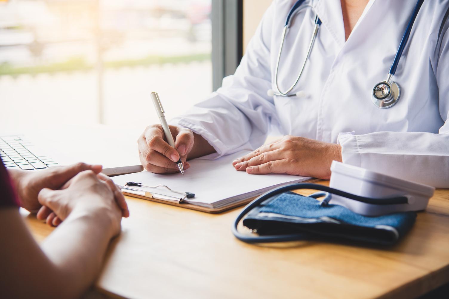 doctor speaking with a patient
